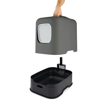 Removable grey cover of a cat litter box with viewing window, black tray and litter scoop visible underneath.