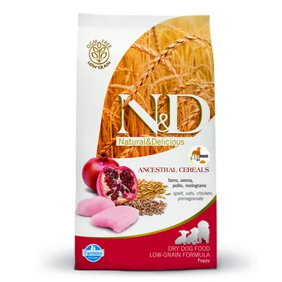 Hrană uscată pentru câini pui Farmina N&D Ancestral Cereals, spelt, ovăz, pui, rodie. Text vizibil: OGM FREE LOW GRAIN, Maxi, Dry Dog Food Low-Grain Formula Puppy.