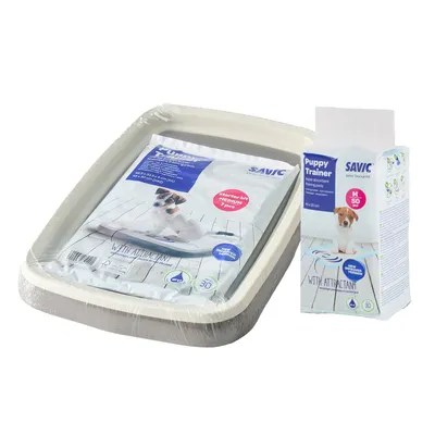 Savic Puppy Trainer Starter Kit Medium, 7 tappetini, 45x30 cm. Elevata capacità assorbente con attrattivo. La confezione mostra cane e dettagli del prodotto.