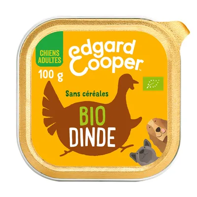 Barquette Edgard Cooper BIO DINDE 100 g, sans céréales, pour chiens adultes. Texte visible : Sans céréales, label bio UE, illustrations de chiens.