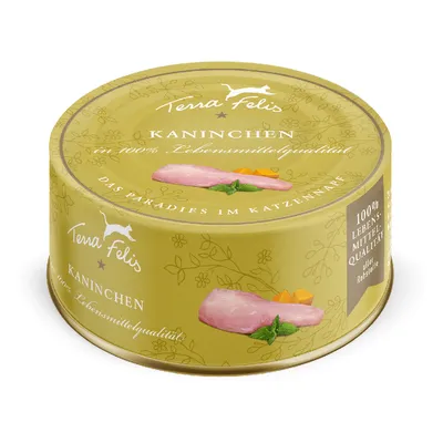 Boîte Terra Felis Kaninchen, texte visible : 100 % Lebensmittelqualität, Das Paradies im Katzenfutter, image de viande et légumes sur l’étiquette. Texte en allemand.