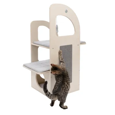 Cat furniture made of wood with two padded resting areas, scratching surface and toy. Cat uses the scratching surface.