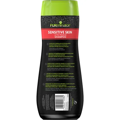 Shampooing Furminator Sensitive Skin Ultra Premium, texte visible en anglais, allemand, français, italien et espagnol, enrichi en extrait de calendula et menthol, sans parabènes ni produits chimiques.