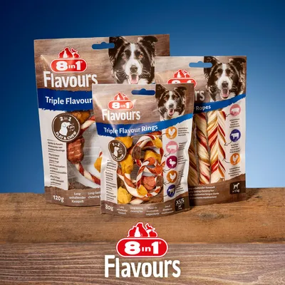 Three packs of 8 in 1 Flavours treats, showing Triple Flavour Rings and Ropes with icons for chicken, duck, beef, and long-lasting chewing. 2 in 1 play and chew feature visible.