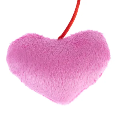 Plush toy in heart shape, pink with red ribbon.