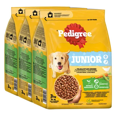 Lot de 4 sacs Pedigree Junior, 3 kg chacun, croquettes visibles, mention « à la volaille et aux légumes », ingrédients naturels, prébiotiques, superfoods, sans colorants artificiels ajoutés.