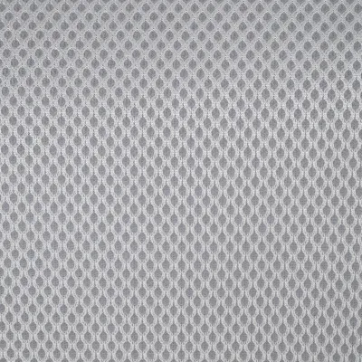 Gros plan sur un tissu en maille grise à structure alvéolée, matériau visible utilisé pour certains accessoires ou couchages pour animaux.
