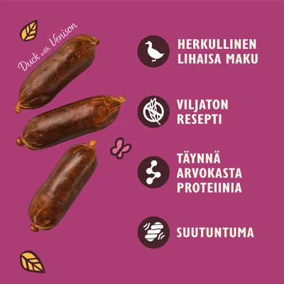 Kolme makkaran muotoista tuotetta, teksti: Duck with Venison. Herkullinen lihainen maku, viljaton resepti, täynnä arvokasta proteiinia, suutuntuma.