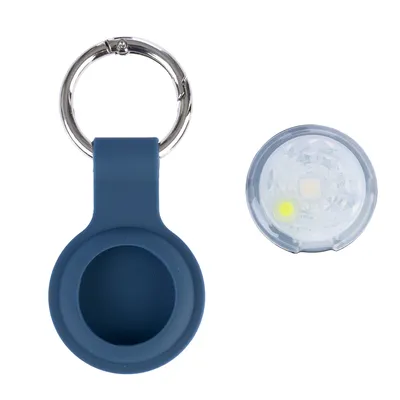 Porte-clé en silicone bleu avec anneau métallique et accessoire rond transparent à LED, présentés côte à côte. Aucun texte visible ni marque apparente.