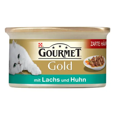 Lata de comida para gatos Gourmet Gold, texto visível: 'mit Lachs und Huhn'. Imagem de um gato branco e prato com pedaços de carne. Rótulo em alemão.