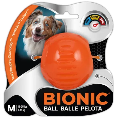 BIONIC Ball size M, suitable for dogs 7-15 kg. Text: Tail Wagging Durability™, Résiste à toutou™. Rating scale with three criteria: Max, Strong, Bionic.