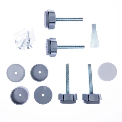 Kit de montage comprenant 4 vis avec molettes grises, 4 capuchons ronds en plastique gris, 1 clé plate métallique et 4 vis supplémentaires avec chevilles.