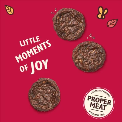 Three round meat treats with text: 'Little moments of joy' and a badge stating 'with freshly prepared proper meat, never meat meal'.