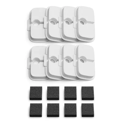 Set of white filter inserts with central opening and black foam pads, suitable for water filters or similar applications.