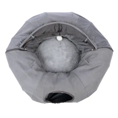Grey, round pet bed with soft inner cushion and a small opening. A hanging toy is visible inside.