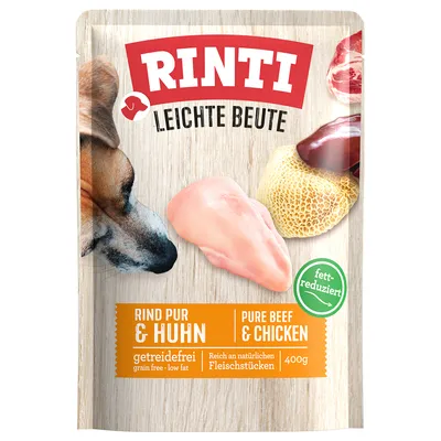 RINTI LEICHTE BEUTE Rind pur & Huhn, pure beef & chicken, getreidefrei, reich an natürlichen Fleischstücken, fett-reduziert, 400g. Image d’un chien et morceaux de viande visibles.