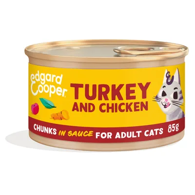 edgard cooper TURKEY AND CHICKEN, chunks in sauce for adult cats, 85g. Gele kattenvoerblik met illustratie van kat en ingrediënten.