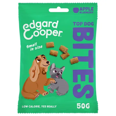 Edgard Cooper Top Dog Bites appel en blauwe bes, small in size, 50g. Tekst: low calorie, yes really. Afbeelding van honden en zichtbare brokjes op de verpakking.