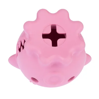 Balle rose en plastique avec ouverture en forme de croix sur le dessus et dents visibles sur le côté, jouet pour animaux.