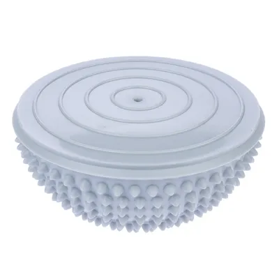 Strumento rotondo grigio per massaggi e cura con struttura a nodi sul lato inferiore, adatto per la cura del pelo o massaggi.