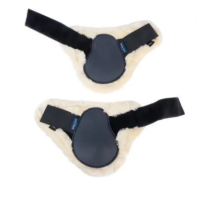 Deux protections en tissu beige avec surface noire et fermeture velcro, étiquettes visibles portant l’inscription 'TAIL' et 'BELLY', tailles différentes.