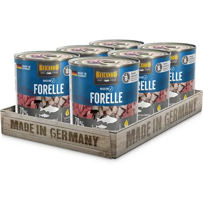 Belcando Dog Food Baseline trout, 70% fish content, Made in Germany. Six cans on wooden tray with 'Made in Germany' inscription.