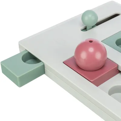 Spielzeug aus Kunststoff mit Schiebefächern und farbigen Kugeln in Rosa und Grün, geeignet für interaktives Spielen.