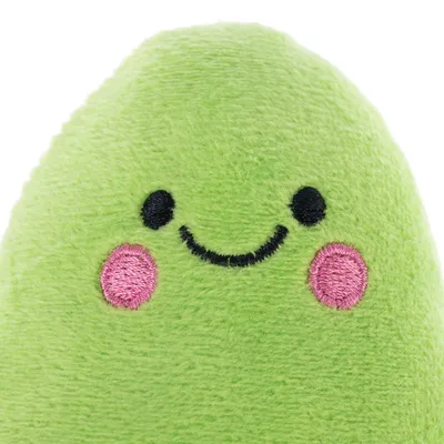 Green plush toy with embroidered face, black eyes, pink cheeks and a smiling mouth.