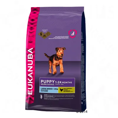 Saco de ração Eukanuba Puppy 1–24 Months para cães de raça grande >25 kg. Texto visível: First ingredient: chicken. Imagem de cachorro na embalagem.