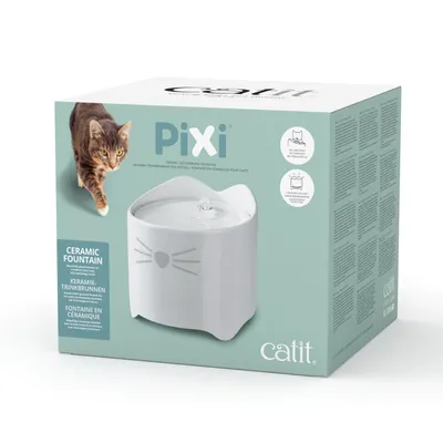 Emballage de fontaine en céramique pour chats Catit Pixi, image du produit et texte : 'Fontaine en céramique', 'Catit', instructions multilingues visibles sur le côté.