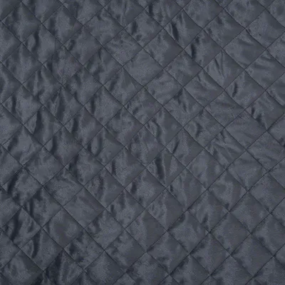 Dunkelgrauer, gesteppt strukturierter Stoff mit quadratischem Muster. Material für Haustierprodukte oder Zubehör sichtbar.