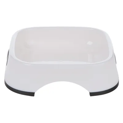 White feeding bowl with non-slip base and ergonomic recess for easy gripping.