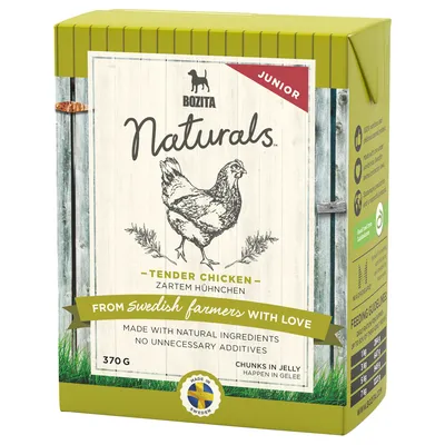 Упаковка Bozita Naturals Junior, курица, 370 г. Видна надпись: 'From Swedish farmers with love', 'Made with natural ingredients', таблица кормления сбоку.