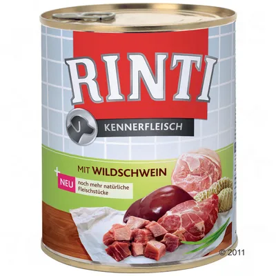 Konzerva Rinti Kennerfleisch mit Wildschwein, obrázek masa a text: NEU noch mehr natürliche Fleischstücke