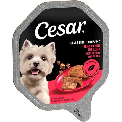 Cesar Classic Terrine, rich in beef with liver. Made with high-quality ingredients. Image of terrine pieces on a red plate. Cesar Classic Terrine, rich in beef with liver. Made with high-quality ingredients. Image of terrine pieces on a red plate.