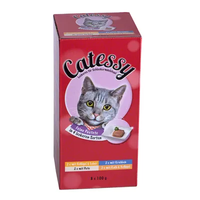 Emballage Catessy pâtée pour chat, 8 x 100 g, assortiments visibles : volaille et foie, dinde, crabe, veau et volaille. Texte en allemand sur l’emballage.