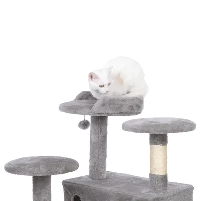Grey cat tree with multiple levels, sisal scratching surface and play ball. White cat lying on the top platform.