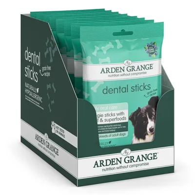Display box of dental sticks with grain free recipe, naturally hypoallergenic, not tested on animals, and superfoods highlighted on the packaging.