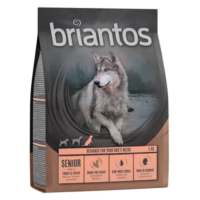 Briantos Senior pasja hrana, bogata s puranom in krompirjem, brez žit, polvlažni briketi, proizvedeno v Nemčiji. Embalaža prikazuje volka in podatke o izdelku.