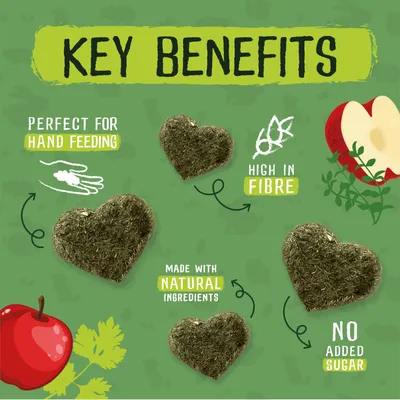 Key benefits: perfect for hand feeding, high in fibre, made with natural ingredients, no added sugar. Heart-shaped treats shown with apple and herb illustrations.