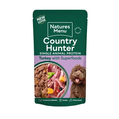 Country Hunter single animal protein turkey with superfoods, showing natural ingredients, no grain, hypoallergenic. Image includes food, raw ingredients, and a pet.