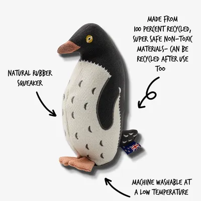 Penguin-shaped toy with natural rubber squeaker, made from 100 percent recycled, non-toxic materials, recyclable after use, and machine washable at a low temperature.