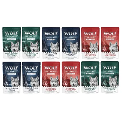Wolf Wilderness Triple Taste natvoerzakjes, varianten: Mediterranean Coastlines, Scandinavian Fjords, Canadian Woodlands. Verpakking met afbeelding van een wolf, 12 stuks zichtbaar.