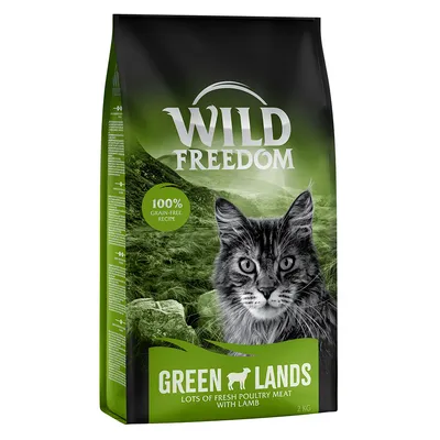 Sac Wild Freedom Green Lands, 2 kg, texte visible : 100% grain-free recipe, lots of fresh poultry meat with lamb, image de chat sur fond vert montagneux.