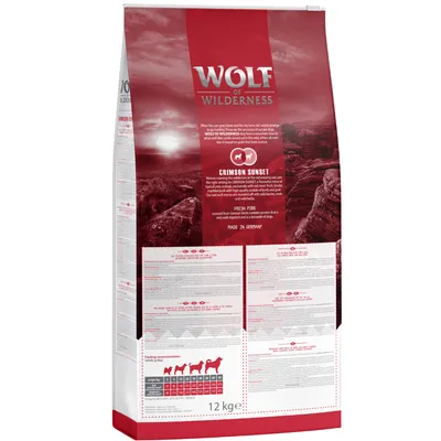 Wolf of Wilderness Crimson Sunset hundefoder, 12 kg. Synlig tekst: Fresh Pork, Made in Germany. Fodringsvejledningstabel pr. hundevægt nederst på posen.