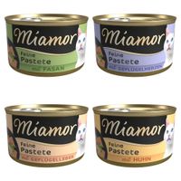 Miamor Feine Pastete mit Geflügelherzen, 24x Dose, lila Verpackung mit weißer Katze abgebildet.