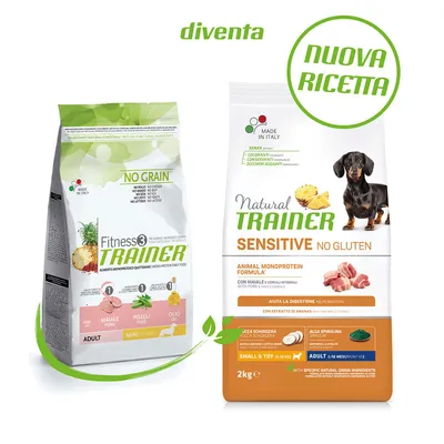 Два пакета кучешка храна: Fitness3 Trainer No Grain Mini с прасе, грах и олио; Natural Trainer Sensitive No Gluten с прасе за малки породи. Видими надписи: 'diventa', 'NUOVA RICETTA'.