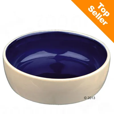 Gamelle en céramique bleu foncé, mention « Top Seller » en haut à droite sur fond orange.