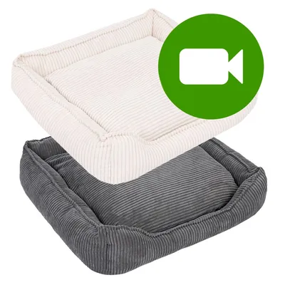 Przycisk odtwarzania wideo. Kliknij tutaj, aby obejrzeć film prezentujący dwa prostokątne legowiska z tkaniny sztruksowej w kolorze kremowym i szarym. Przycisk odtwarzania wideo. Kliknij tutaj, aby obejrzeć film prezentujący dwa prostokątne legowiska z tkaniny sztruksowej w kolorze kremowym i szarym.