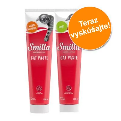 Dve tuby Smilla Cat Paste, jedna s označením Multivitamin, druhá Malt, každá 200 g. Oranžový kruh s textom: Teraz vyskúšajte!